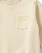 Abiba Soft Bow Pocket Sweatshirt